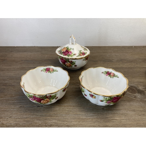 359 - A collection of Royal Albert Moonlight Rose and Old Country Roses bone china