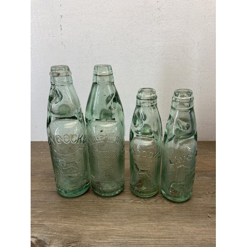 362 - A collection of antique and vintage glass bottles