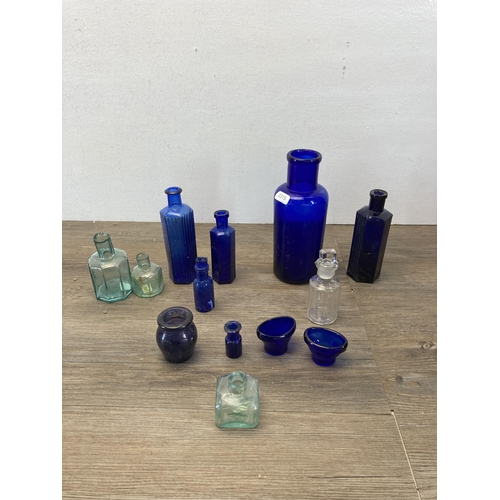 362 - A collection of antique and vintage glass bottles