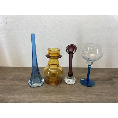 363 - A collection of glassware to include Mats Jonasson full lead crystal bird paperweight, three piece d... 