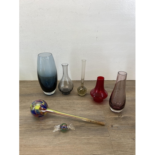 366 - A collection of glassware to include Caithness vase, Kosta Boda Rainbow vase etc.