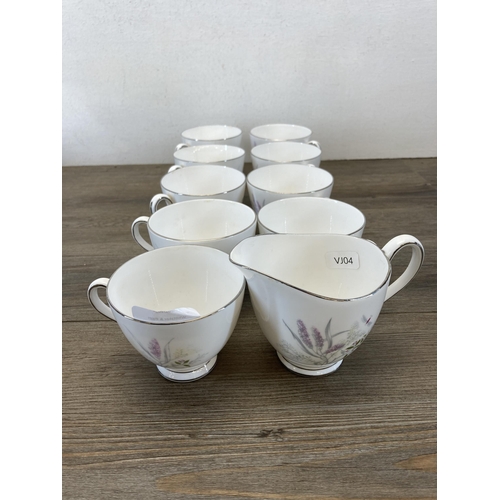 371 - A collection of Tuscan fine English bone china