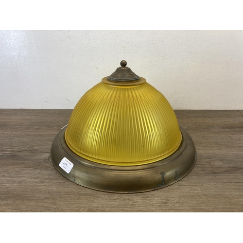 485C - A contemporary Lightique Ltd brass and yellow glass ceiling light - approx. 38cm in diameter