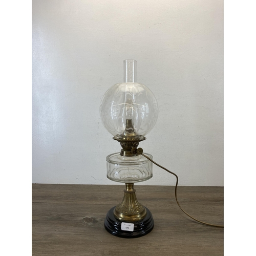 479 - A Victorian Duplex brass and clear glass converted electric oil lamp with acid etched spherical shad... 