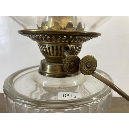 479 - A Victorian Duplex brass and clear glass converted electric oil lamp with acid etched spherical shad... 