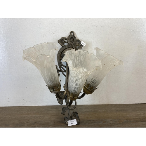 481 - An Art Nouveau style brass effect three branch wall light with frosted glass bell flower shaped shad... 