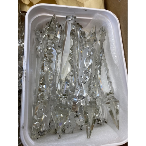 484 - A large collection of cut glass chandelier/lustre droplets