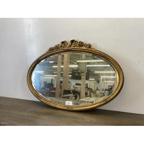 485 - Four items, one 19th century style gold painted oval bevelled edge wall mirror, 19th century style g... 