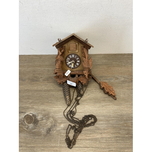 487 - A vintage wooden cuckoo clock