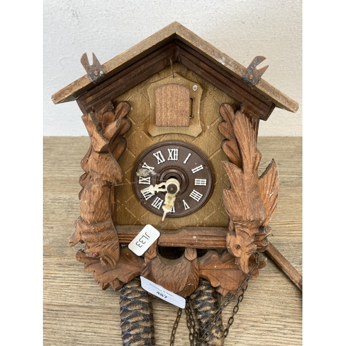 487 - A vintage wooden cuckoo clock