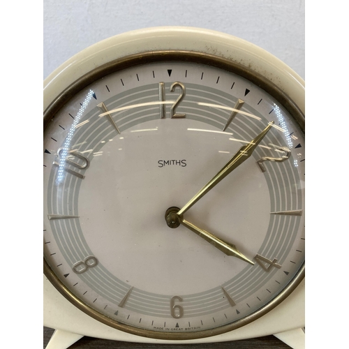 489 - A mid 20th century Smiths white plastic mantle clock - approx. 19cm high x 18cm wide