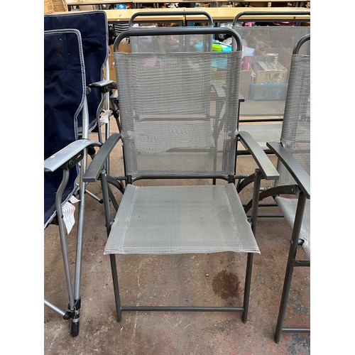 813 - Four grey metal folding garden chairs