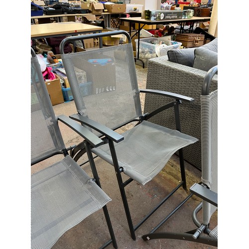 813 - Four grey metal folding garden chairs