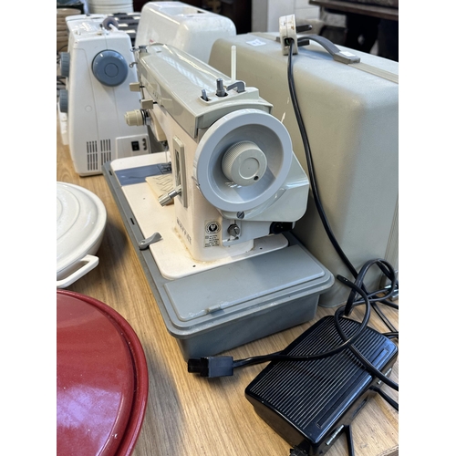 707 - A cased Merritt 159 electric sewing machine with foot pedal and instruction manual