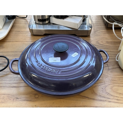 713 - A Le Creuset Ultra Violet enamelled cast iron 30cm shallow casserole