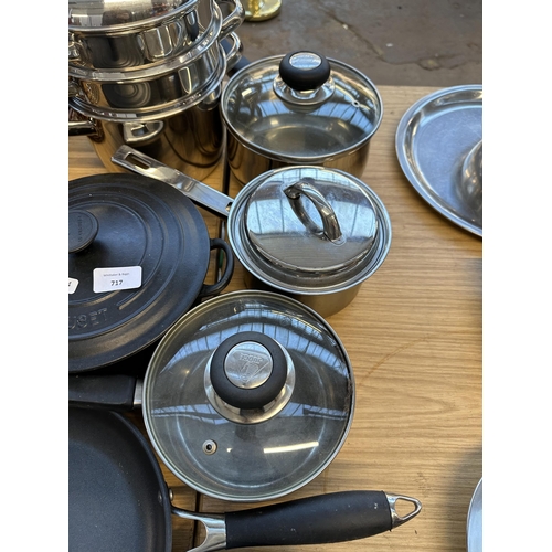 717 - A collection of good quality cookware to include Le Creuset 20cm casserole, John Lewis non-stick fry... 