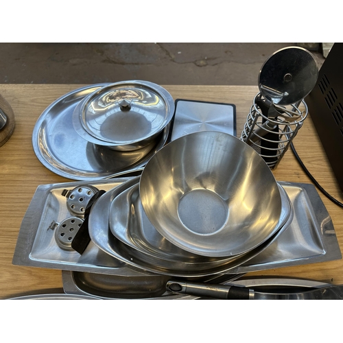 718 - A collection of stainless steel serveware to include Old Hall, Alfra etc.