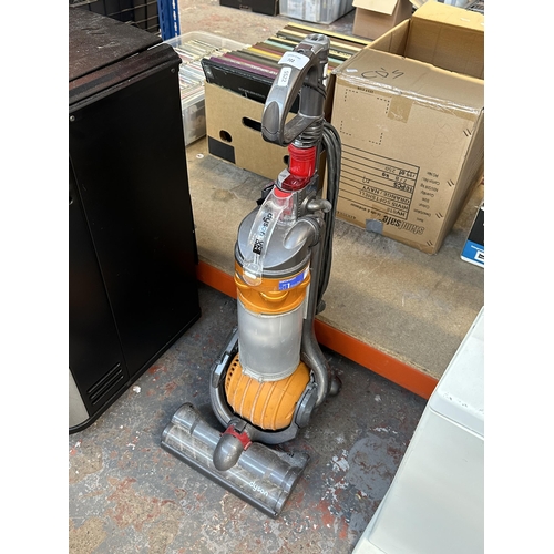 722 - A Dyson DC24 upright bagless vacuum cleaner