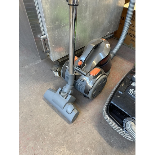 730 - Two cylinder vacuum cleaners, one Sebo Airbelt K1 Pet Plus with attachments and one Goodmans TurboMA... 