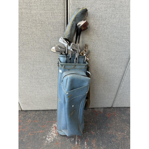 744 - A golf bag containing golf clubs to include MacGregor Colokrom, Slazenger by Jack Nicklaus etc.