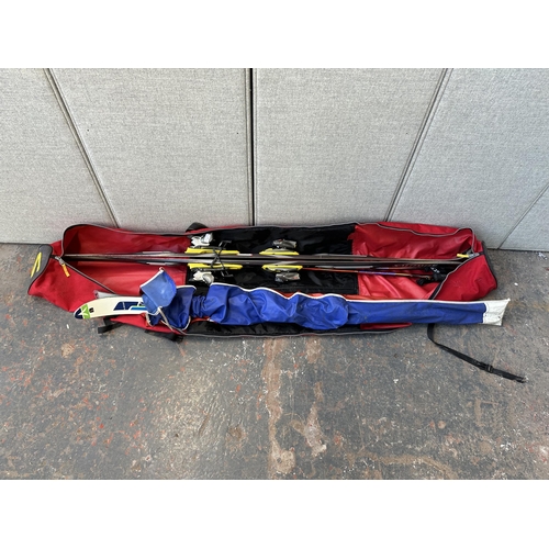 745 - Two cased pairs of skis, one Salomon 900S with pair of Scott Edge poles and one Dynastar