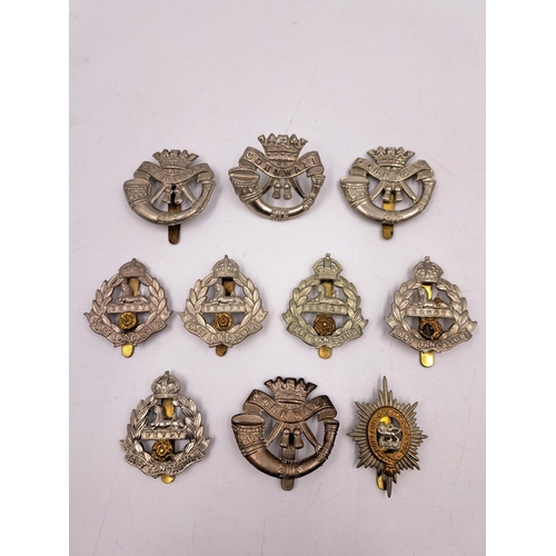 2283 - Ten military cap badges