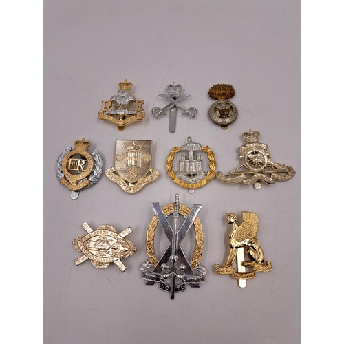 2285 - Ten military cap badges