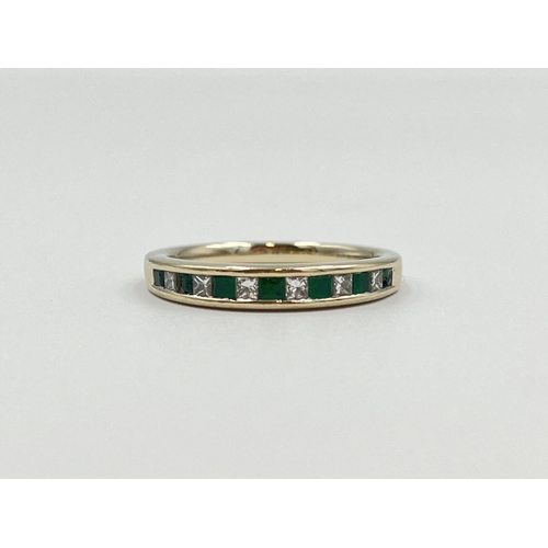 2006 - An 18ct gold emerald and 0.28ct diamond ring, size Q½ - approx. gross weight 4.3g