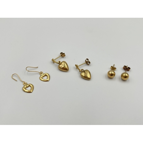 2009 - Three pairs of gold earrings, two 9ct - approx. 1.7g and one 18ct heart shaped - approx. 0.3g