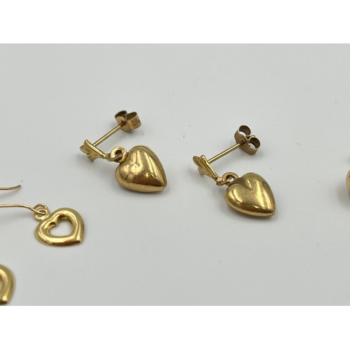 2009 - Three pairs of gold earrings, two 9ct - approx. 1.7g and one 18ct heart shaped - approx. 0.3g