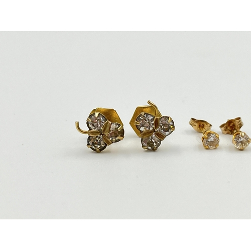 2010 - Three pairs of 9ct gold and CZ earrings - approx. gross weight 1.7g