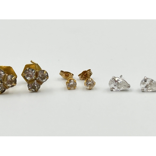 2010 - Three pairs of 9ct gold and CZ earrings - approx. gross weight 1.7g