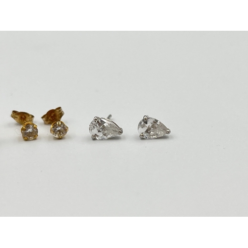 2010 - Three pairs of 9ct gold and CZ earrings - approx. gross weight 1.7g