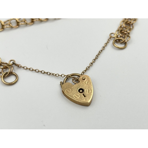 2058 - A hallmarked London 9ct gold bracelet with heart shaped padlock clasp - approx. gross weight 7.8g