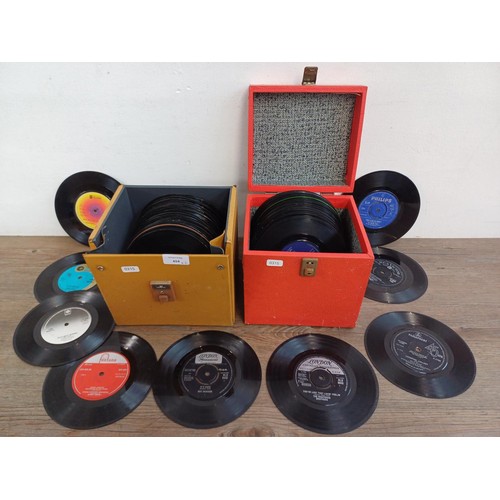 654 - Two record cases containing 7