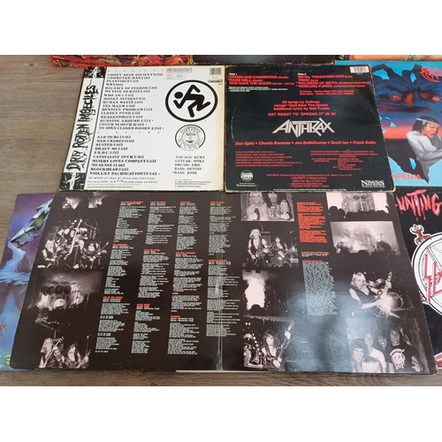 656 - A collection of rock and punk vinyl records to include Slayer, Metallica, Anthrax, D.R.I., Sepultura... 