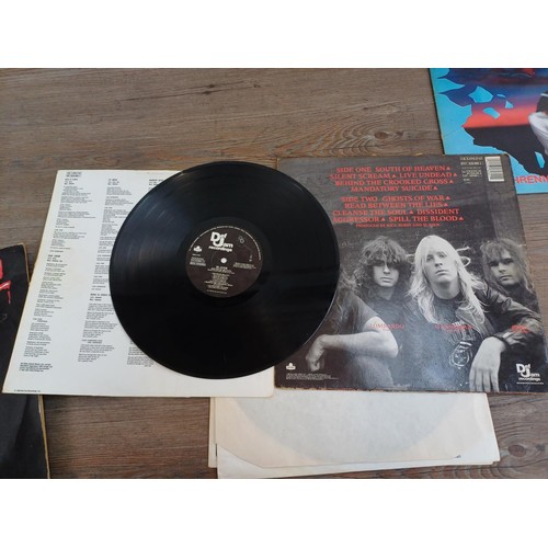 656 - A collection of rock and punk vinyl records to include Slayer, Metallica, Anthrax, D.R.I., Sepultura... 