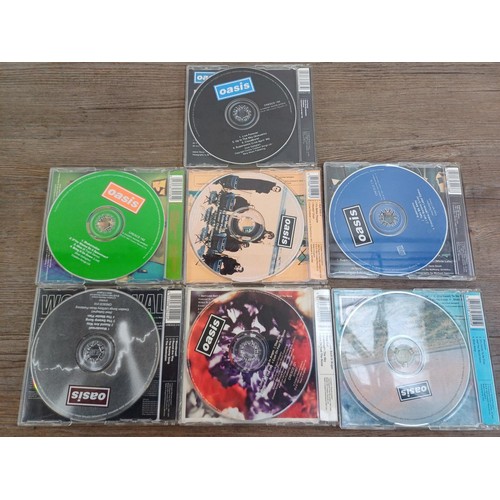 662 - Seven Oasis CD singles, Shakermaker, Wonderwall, Don't Look Back In Anger, Whatever, Supersonic, Rol... 