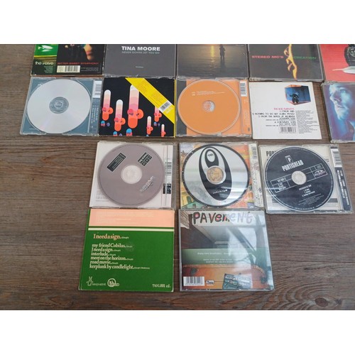 663 - A collection of CD singles to include The Chemical Brothers, Pavement, Portishead, The Boo Radleys, ... 