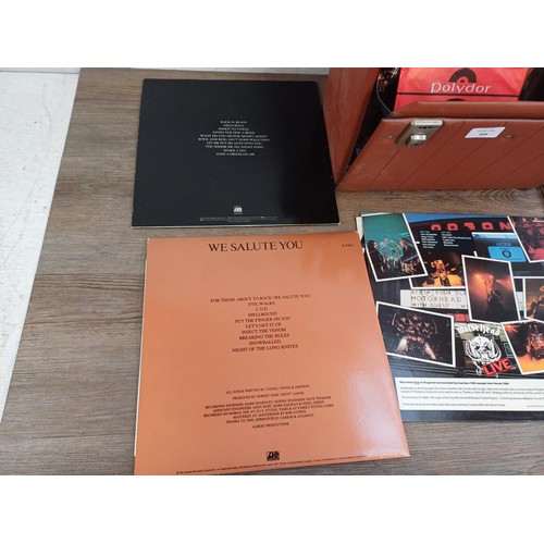 666 - A record case containing vinyl records to include ACϟDC, Iron Maiden, Motörhead, The Rolling Stones,... 