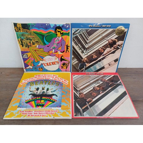 667 - Four The Beatles LP vinyl records, Magical Mystery Tour with booklet, A Collection of Beatles Oldies... 