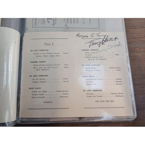 671 - Two folders containing signed items to include Frank Sinatra, Mae West, Peter Cushing, Peggy Mount, ... 