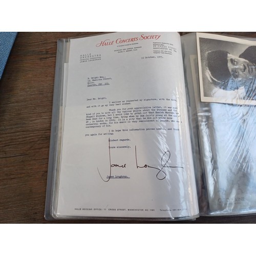 671 - Two folders containing signed items to include Frank Sinatra, Mae West, Peter Cushing, Peggy Mount, ... 