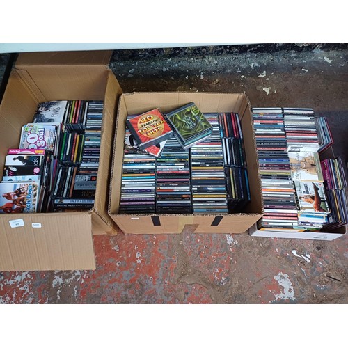 672 - Three boxes containing a large collection of CDs - see images for titles