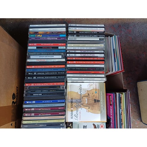 672 - Three boxes containing a large collection of CDs - see images for titles