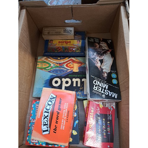 869A - Three boxes containing mid 20th century boxed games, Tudor Rose plastic dumper truck, boxed Airfix S... 