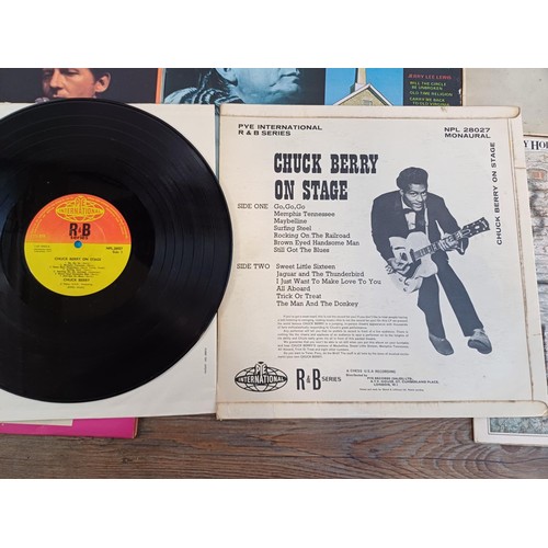 687 - Eleven rock 'n' roll LP vinyl records to include Chuck Berry, Buddy Holly, Eddie Cochran, Jerry Lee ... 