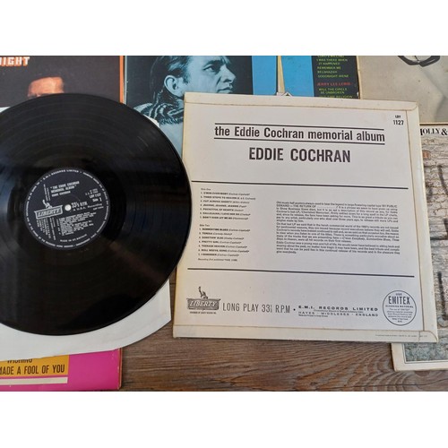 687 - Eleven rock 'n' roll LP vinyl records to include Chuck Berry, Buddy Holly, Eddie Cochran, Jerry Lee ... 