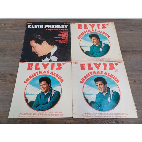 689 - Twenty three Elvis Presley vinyl records to include 'Something For Everybody', 'The Best Of' 10