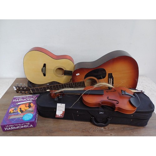 693 - Four musical instruments, two guitars, one violin and one boxed harmonics